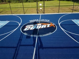 Close-up of Dream Court logo on game court flooring for Nancy Lieberman Charities and Sport Court partnership