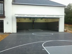 Indoor and outdoor garage and driveway basketball court