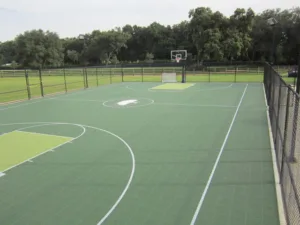 Outdoor multi-sport court with green surfacing
