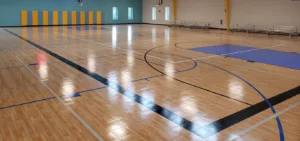 Indoor gynasium flooring with Boys & Girls Club logo