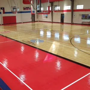 Peacock Boys & Girls Club logo indoor basketball court