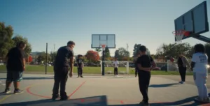 Kids running drills on a court in California