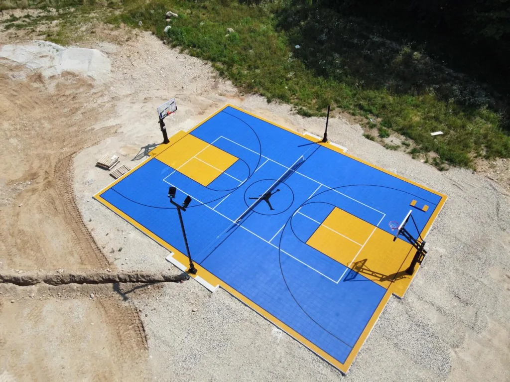 Aerial view of blue and yellow outdoor game court in Wisconsin